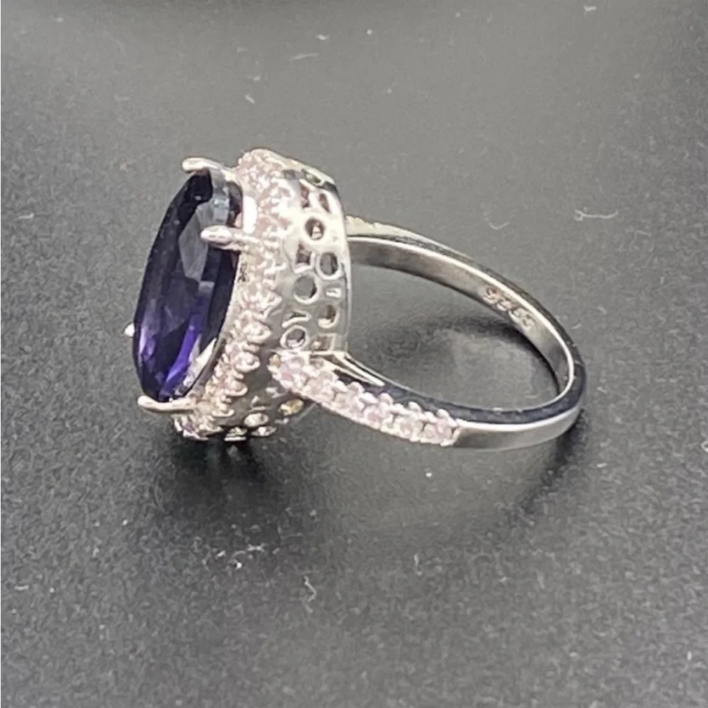 Sterling Silver amethyst prong set cocktail ring with gemstone halo bezel